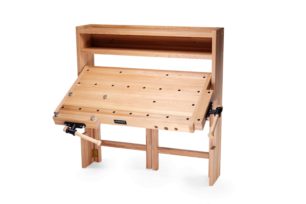RAMIA wall-mounted folding workbench in folding position