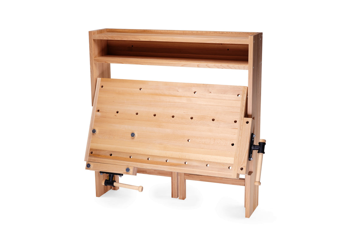 RAMIA wall-mounted workbench in folding position