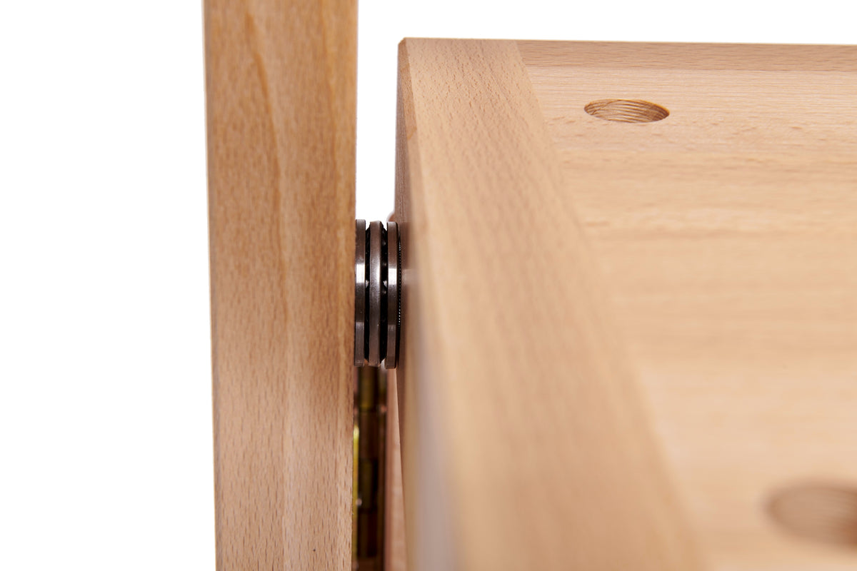 Detail view of RAMIA wall-mounted folding workbench